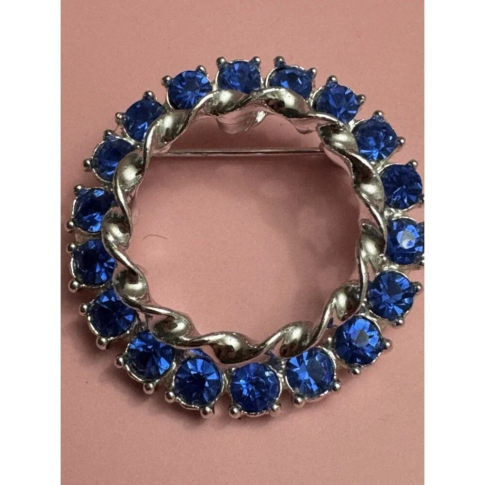 Vintage Sapphire Blue Rhinestone Wreath Brooch Circle Pin Silver Tone 1.25 Inch